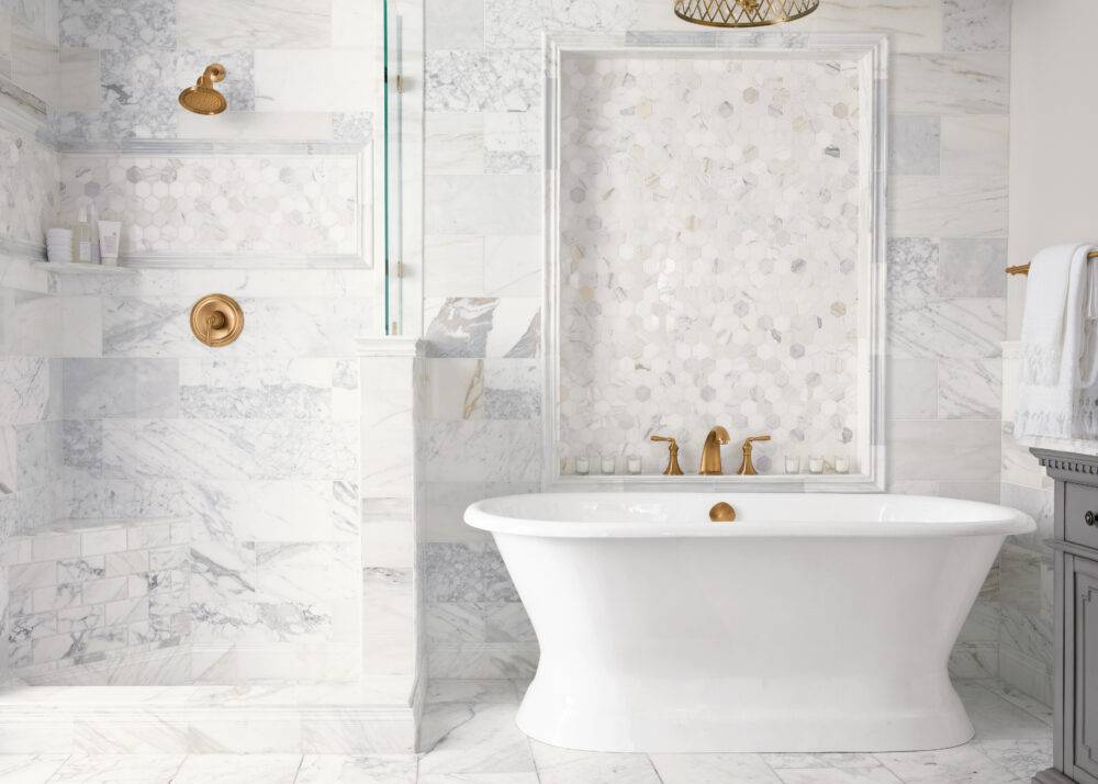White marble bathroom with bold veining.