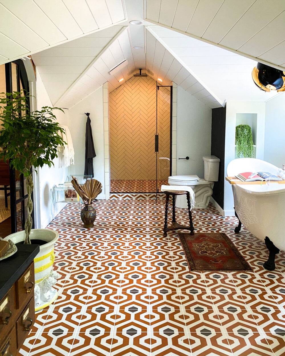 Bathroom featuring bold, geometric Artisan Tiare floor tile.