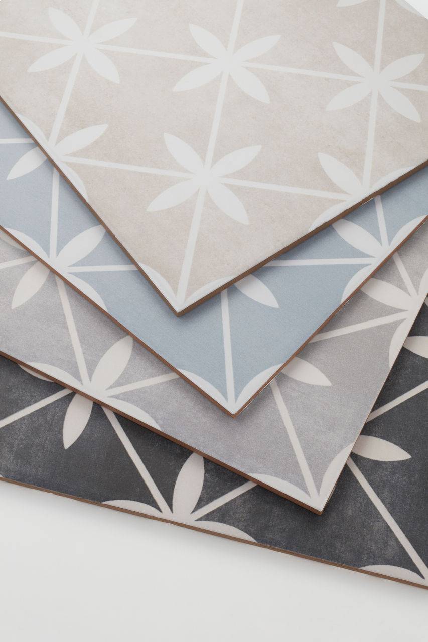 Laura Ashley Wicker tiles in four colorways stacked one on top of the other.