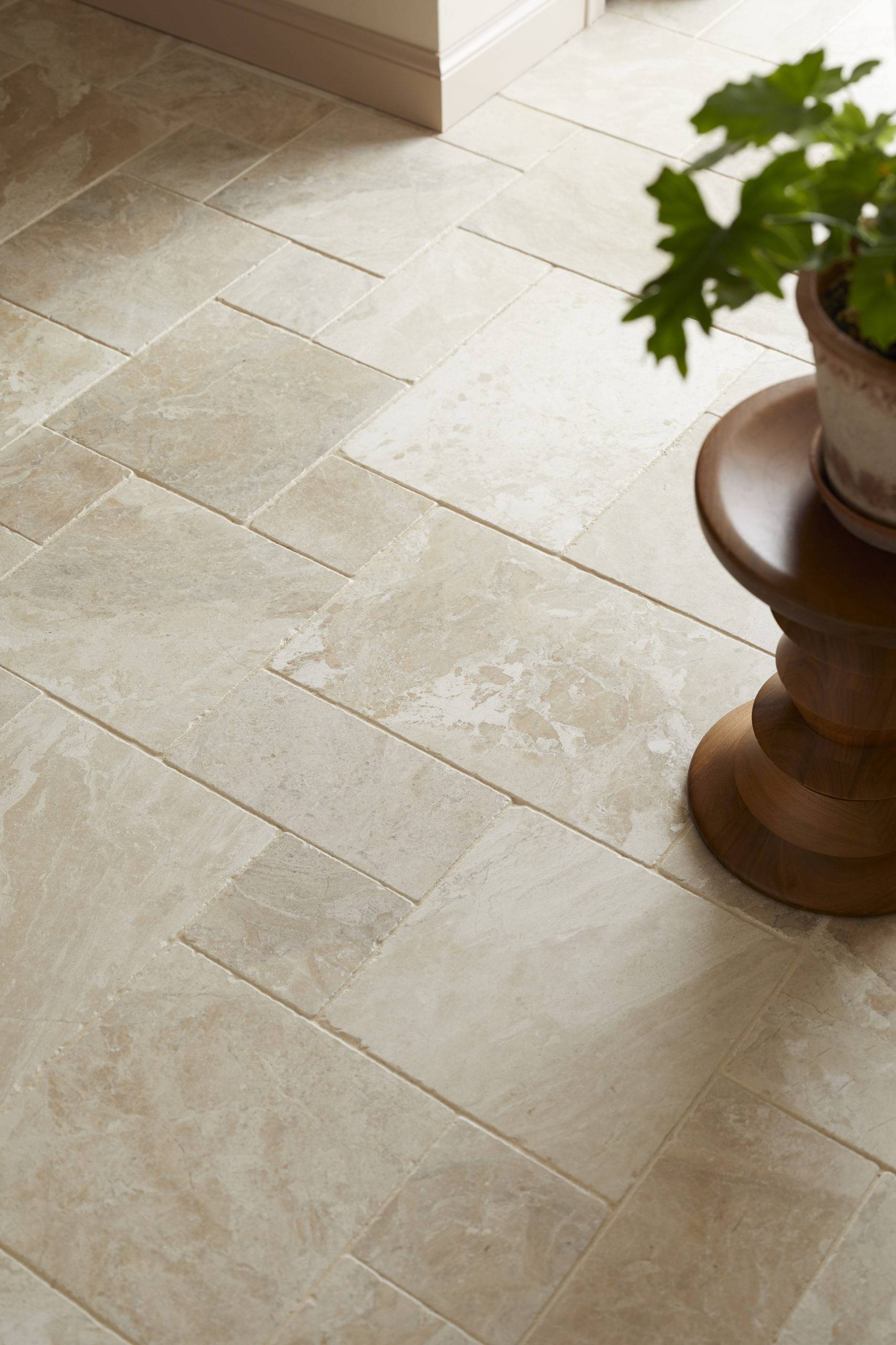 Beige marble tile mosaic flooring